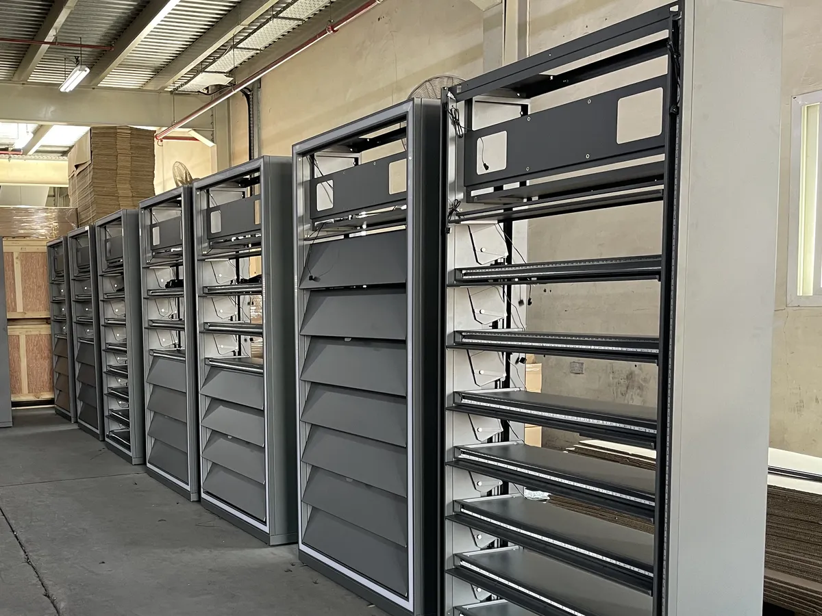 Retail display stands with shelf lighting in serial production at the Ideal Design factory