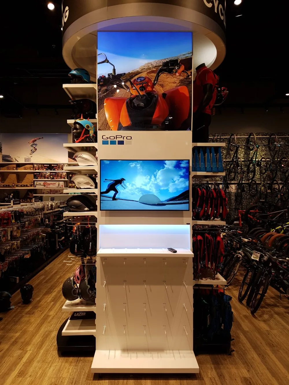 Action camera in store display tower with dual screens built by Ideal Design