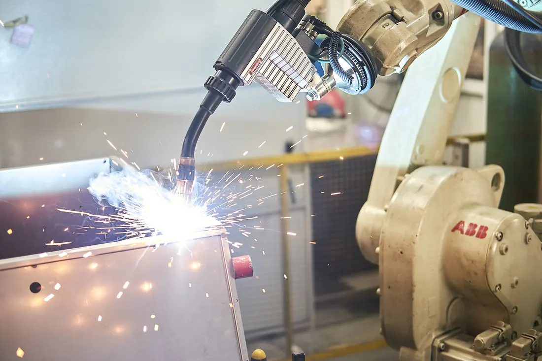 Robotic MIG welding cell in action
